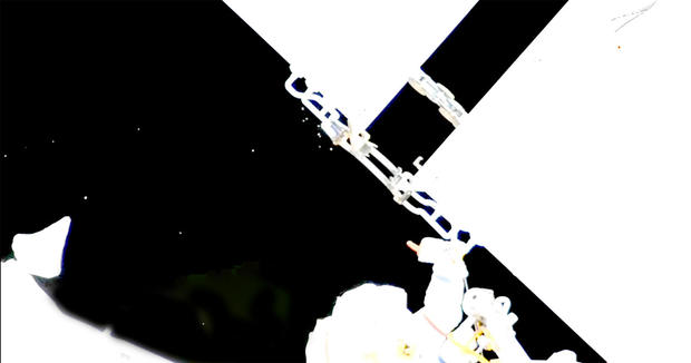 Russian astronauts avoided a coolant leak during a spacewalk after identifying the damaged radiator as the source.