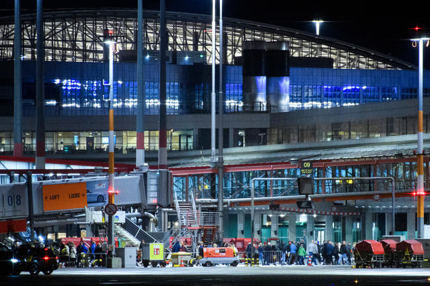 A German airport was shut down when an armed driver broke through a gate and fired a gun.