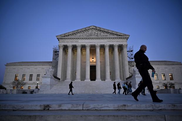 The Supreme Court is considering a crucial obstruction statute while a federal judge cautions about the backlog of cases related to the Jan. 6 incident.