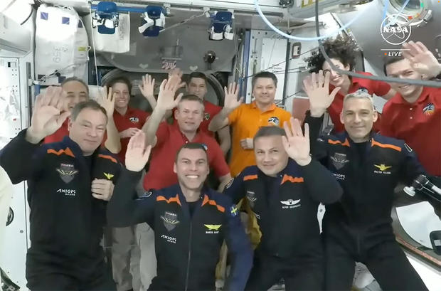 A commercial crew, including the first Turkish citizen to go to space, successfully attaches to the International Space Station.