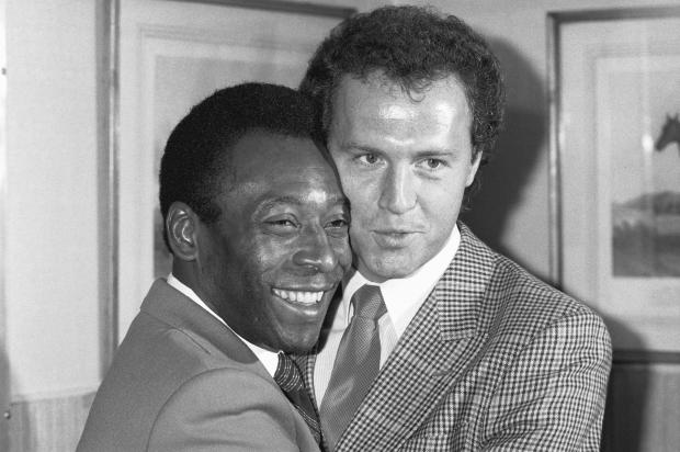 Retired Brazilian soccer star Pele, left, welcomes German soccer player Franz Beckenbauer back to the New York Cosmos. Beckenbauer first signed with the Cosmos in 1977 and played with the team again in 1983. 
