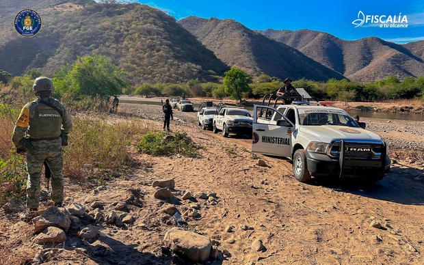 Mexican officials are examining a mass killing following a suspected assault by cartel-operated drones and armed individuals.