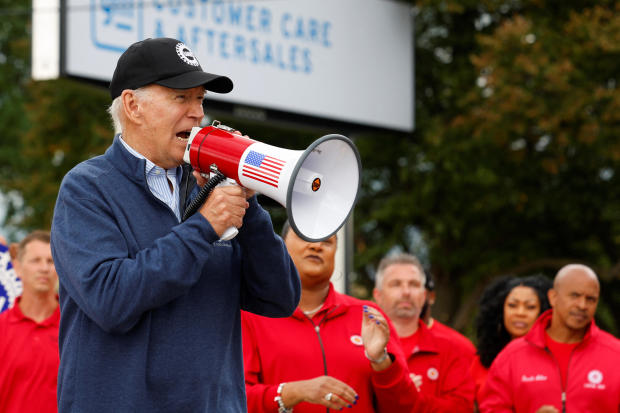 President Biden joins striking members of the United Auto Workers on the picket line outside the GM's Willow Run Distribution Center, in Bellville, Michigan, Sept. 26, 2023. 