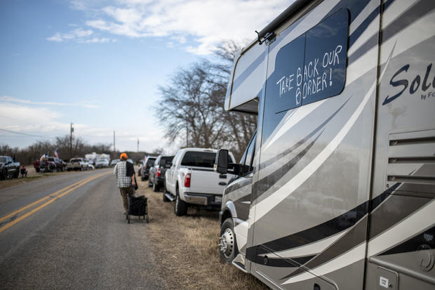 A group of far-right demonstrators, traveling in a convoy, are approaching the southern border to protest the ongoing migrant crisis.