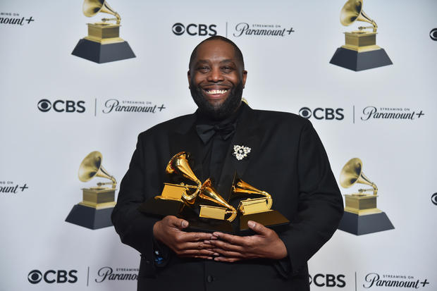 Killer Mike poses in the press room with his 3 Grammy Awards 