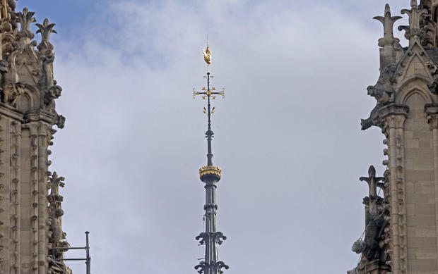 The unveiling of the new spire at Notre Dame in Paris signifies an important step in the cathedral's rebuilding process following the devastating fire.