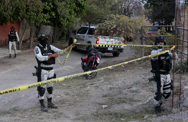 According to family members of the missing individuals from Mexico, a pit fire used for smoking meat revealed "bones, skin, and charred human remains."