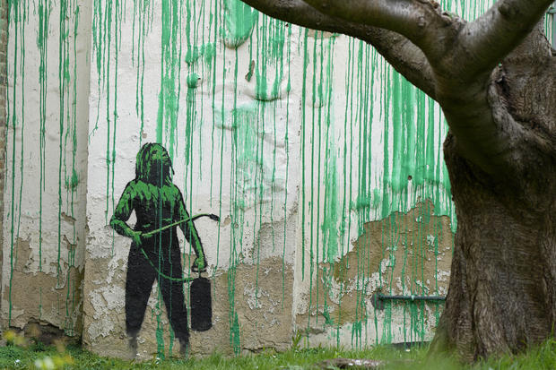 Banksy revealed a fresh piece of street art that has been interpreted by many as a commentary on the state of nature.