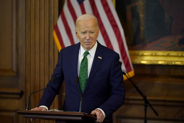 Biden cautions about danger to democratic system while mocking Trump at Washington D.C. comedy event.