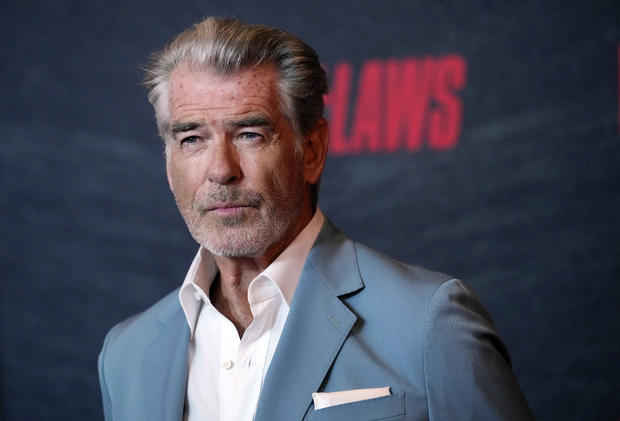 Pierce Brosnan fined for walking off trail in Yellowstone National Park thermal area