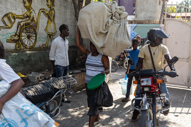 Haitians in the capital Port-au-Prince forced to flee their homes amid spiraling gang violence 