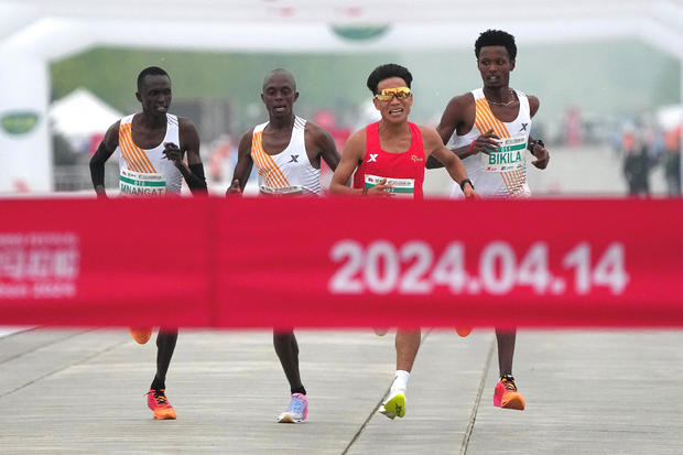 Beijing half-marathon organizers investigating whether competitors let Chinese runner win