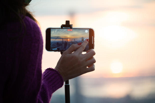 Experts warn not to look at solar eclipse with your phone camera — but share tricks for safely taking pictures