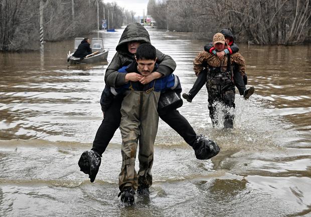 Flooding across Russia's west from melting mountain snow and ice forces mass evacuations