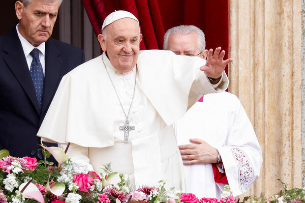 Pope Francis says "peace is never made with weapons" at Easter Sunday mass in St. Peter's Square