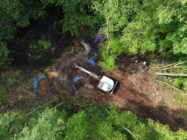 Archaeologists search English crash site of World War II bomber for remains of lost American pilot