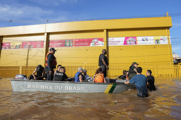 At least 100 dead and dozens still missing amid devastating floods in Brazil