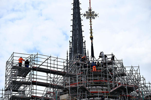 Cross restored to Notre Dame cathedral more than 5 years after fire