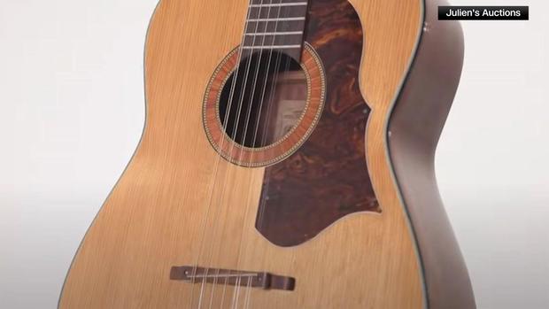 John Lennon's guitar, lost for 50 years, sells for record $2.85 million