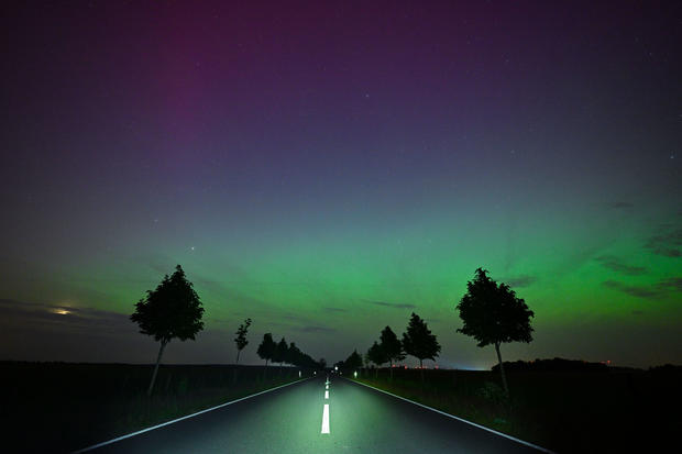 Northern lights shine in the night sky 
