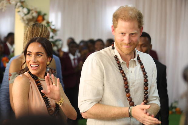 Prince Harry and Meghan visit Nigeria, where the duchess hints at her heritage with students: "I see myself in all of you"