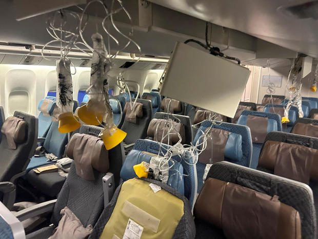 The interior of Singapore Airline flight SG321 is pictured after an emergency landing at Bangkok's Suvarnabhumi International Airport 