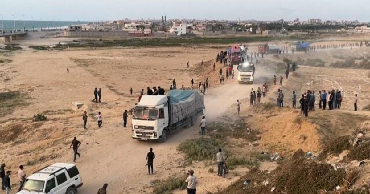 Trucks carrying desperately needed aid are rolling across a newly U.S. built pier into Gaza