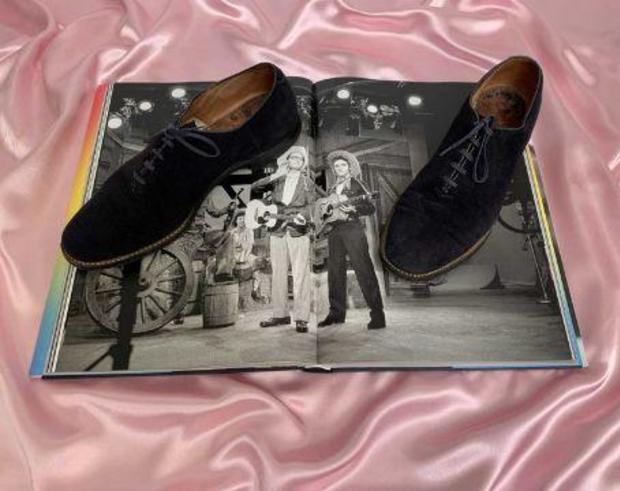 Elvis Presley's blue suede shoes sell at auction