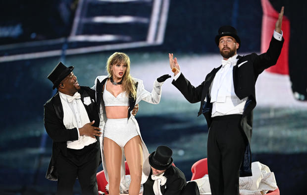 Taylor Swift shouts out boyfriend Travis Kelce on "Eras Tour debut." Here are the other stars who attended her Wembley Stadium shows.