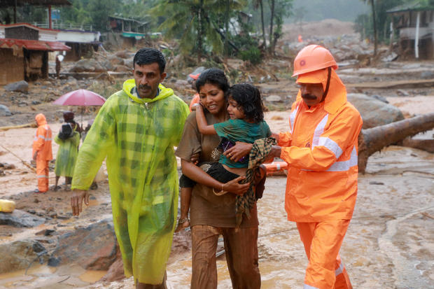 Landslides in India kill at least 60 people as monsoon rains bring misery, floods sweep away homes and roads