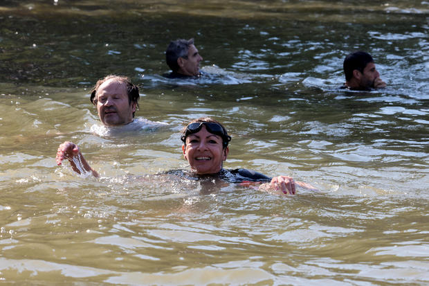 Paris Mayor Anne Hidalgo makes good on vow to swim in the Seine river to show its safe for the Summer Games