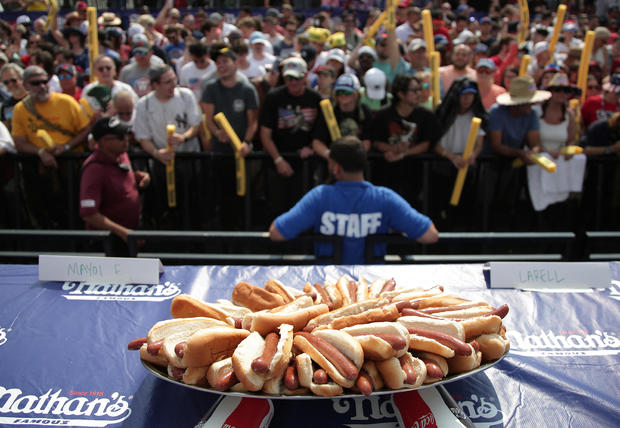 Patrick Bertoletti wins Nathan's Hot Dog Eating Contest with 58 as Miki Sudo sets new women's division record with 51