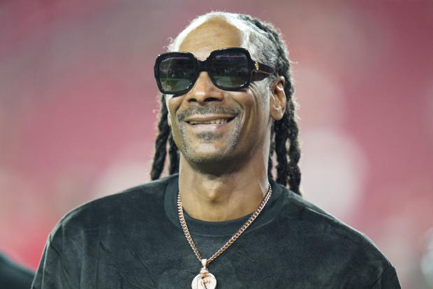 Snoop Dogg to carry Olympic flame on part of final journey to opening ceremony
