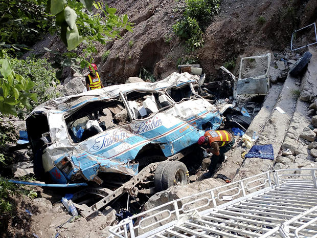 At least 35 killed and dozens injured in 2 separate bus accidents in Pakistan, officials say