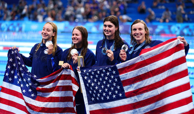 Katie Ledecky becomes most decorated U.S. female Olympian of all time after U.S. takes silver in 4 x 200m freestyle