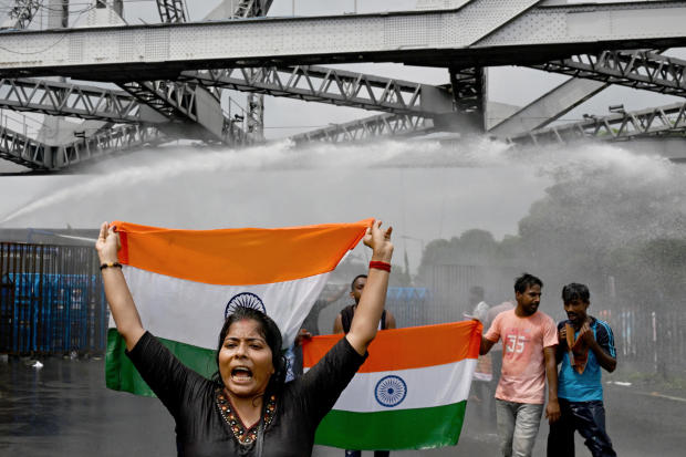 New protests over rape and murder of Indian doctor see police use water cannon, tear gas on demonstrators