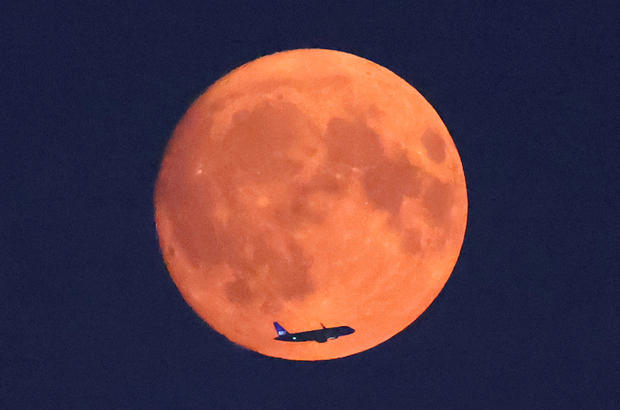 Photos of the blue supermoon show August's rare lunar phenomenon light up the night