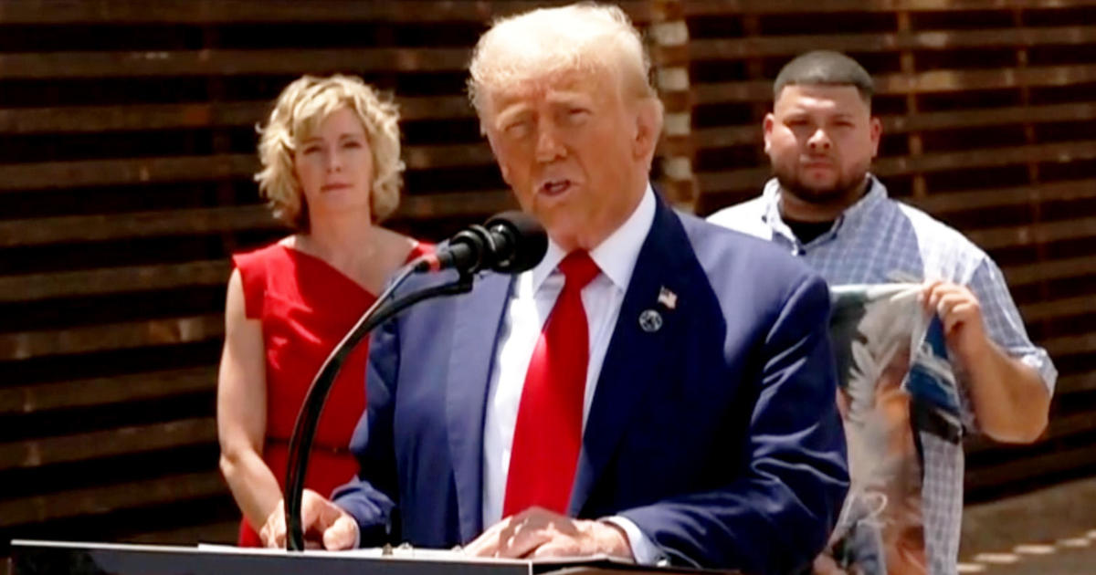 Trump visits Arizona border as he attacks Harris on immigration