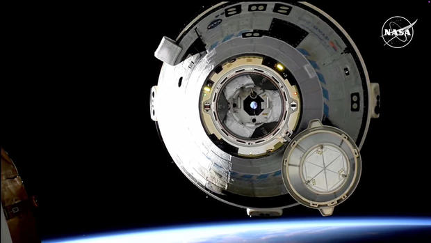 Boeing's troubled Starliner, leaving its crew behind, departs space station for unpiloted return to Earth 