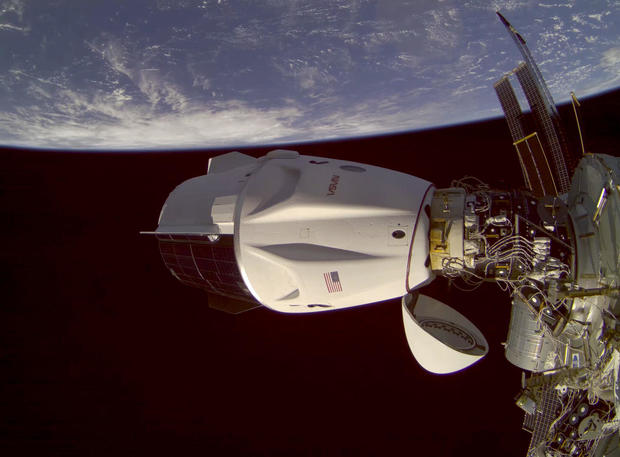 SpaceX Crew Dragon brings 2-man crew to space station amid probe of upper stage anomaly