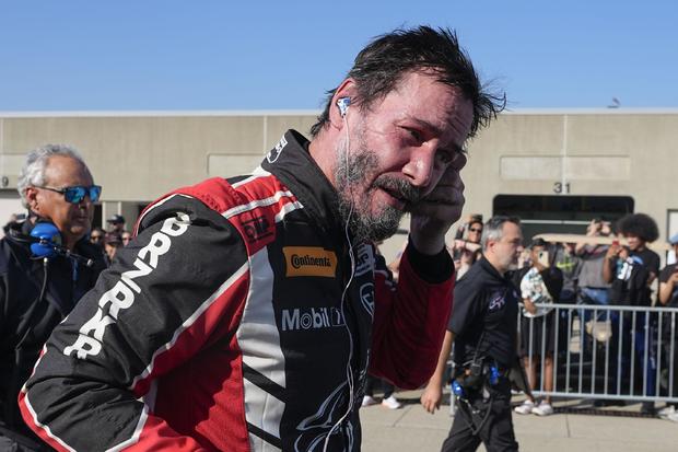 Keanu Reeves debuts as pro auto racer at Indianapolis Motor Speedway, spins out