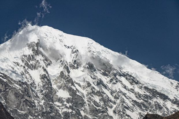 Top mountaineer dies on Nepal peak after making historic ascent; climbing partner says he fell into "depths of the glacier"