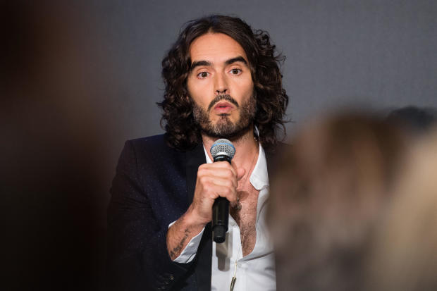 U.K. prosecutors mull whether to charge Russell Brand over sex assault allegations