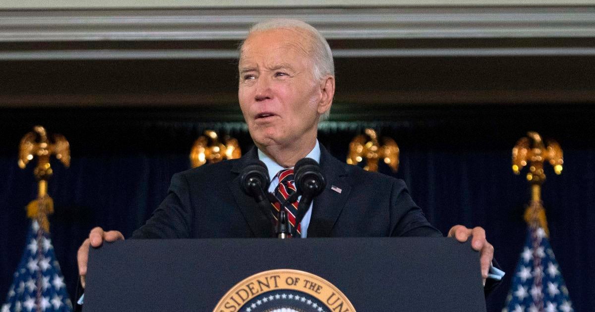 Biden signs defense bill, despite ban on transgender health care for military kids