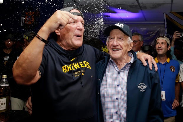 Manager Pat Murphy of the Milwaukee Brewers and Bob Uecker celebrate after the team won the NL Central title at American Family Field on Sept. 18, 2024, in Milwaukee, Wisconsin. 