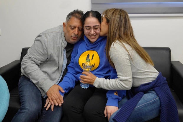 Former Israeli hostage embraces loved ones after being released from Gaza 