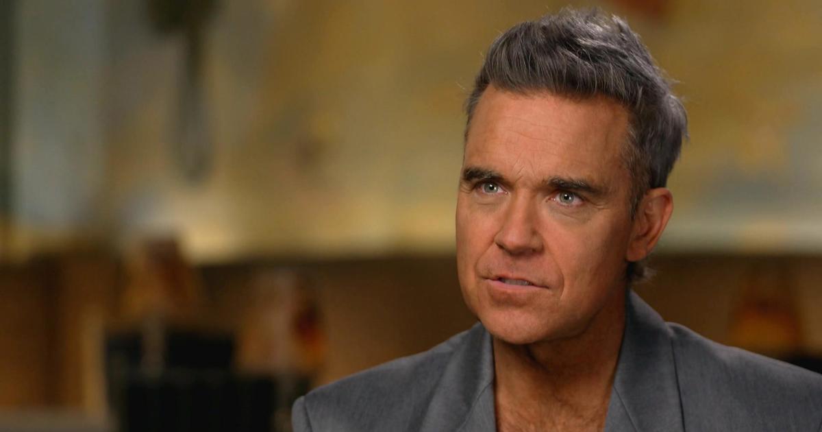 Robbie Williams discusses unique portrayal in "Better Man" and living a life "based on audacity"