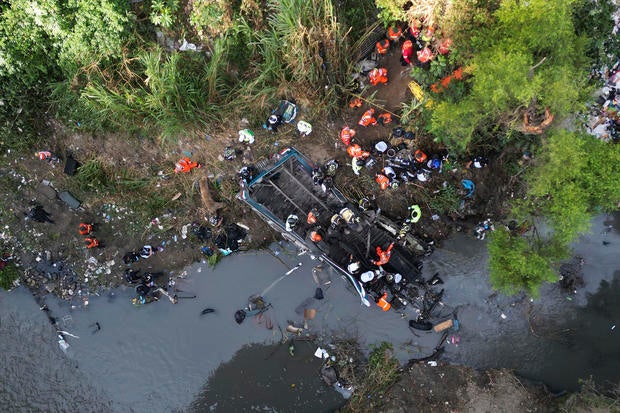 Bus plunges off a Guatemala bridge, killing at least 51 passengers