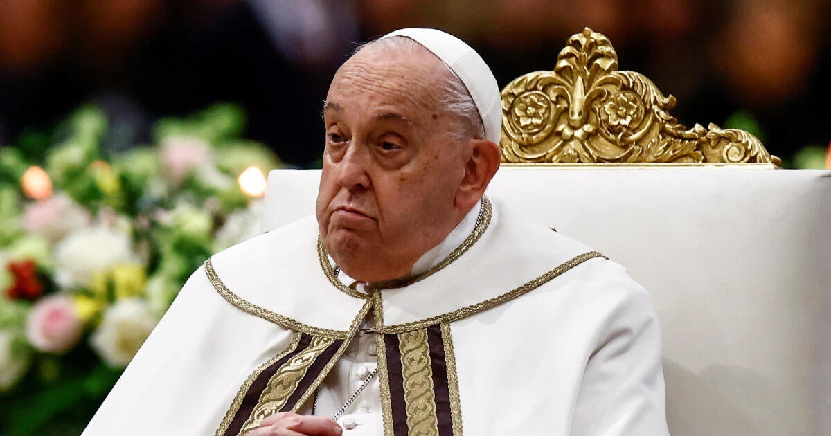 Pope Francis not out of danger, will stay in hospital at least another week, doctors say