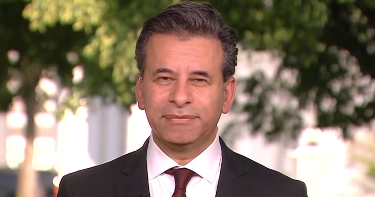 FDA chief says they're looking at whether to approve COVID shots for next winter